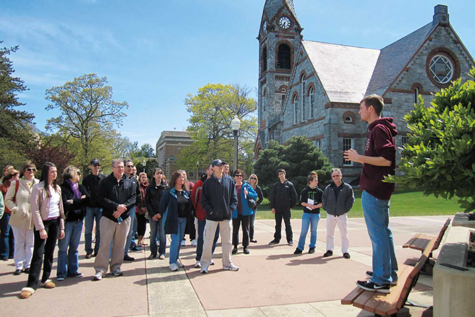 Admissions tour guide giving tour to group of parents and potential students